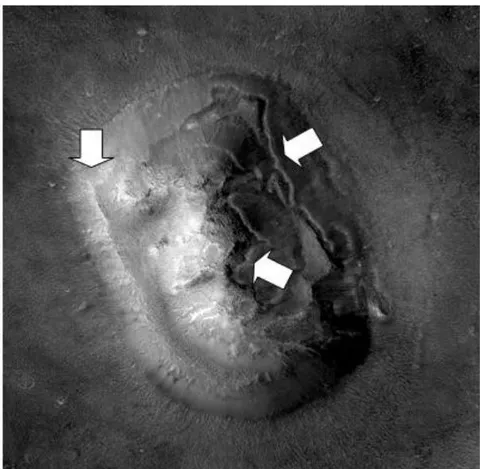 Figure 17: (L) MOC image M16-00184 showing part of the face. (R) MOC image MOC image E03-00824 showing (arrows) eyes, nostrils, frame corner, and helmet ornamentation