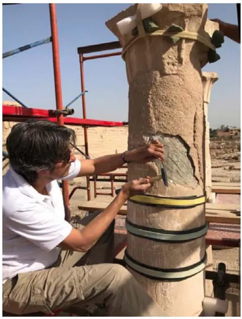Figure 43: Detail of carved plaster of column n.60 (a), detail of carved plaster of column n.61 (b), The conservator Lotfi Hassan, the Author during the pre-consolidation of the plaster before dismantling and moving the column (c). (a)