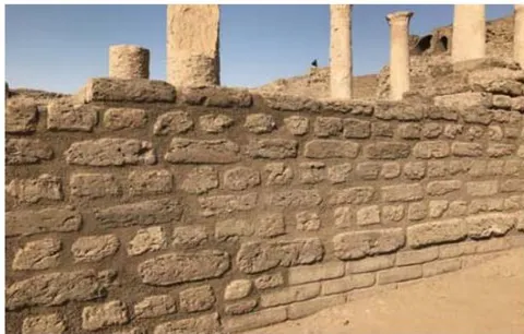 Figure 36: The conservators during the filling of gaps and joints using clay mortar for adobe wall (a, b), the wall after restoration; old parts and new section reconstructed using new mud brick, (c, d).
