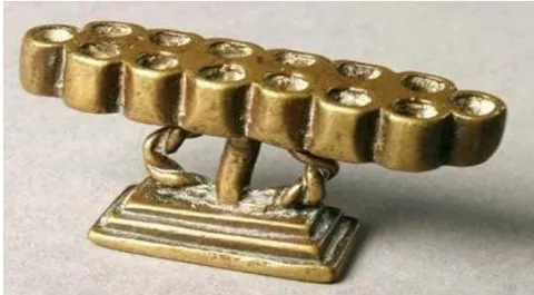 Figure 7: Akan gold-weight, "Oware"