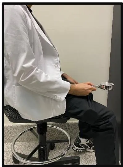 Figure 5: Measurement of pinch strength by using (pinch meter) Sagittal view