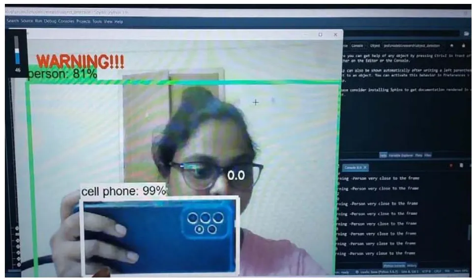 Fig. 6: Image Recognition of person and cell phone