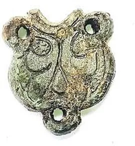 Fig. 4. Bronze pendant with Celtic-style motif, Ravne 3 (photo: Osmanagich, Hoyle, Agić & Delibašić, 2023; republished in Osmanagich, 2025).