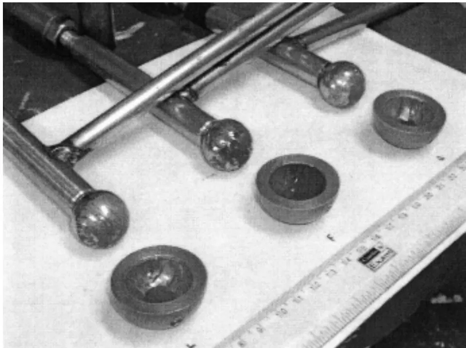 Fig. 2. Set of femur balls & copper metallic shells: 25mm dia and 6mm thick. [These above two photos are taken from the Doctoral Thesis of the author]. [1]