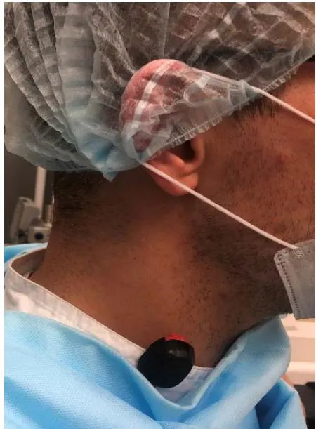 Figure 2: Individual dosimeter fixed in the neck area